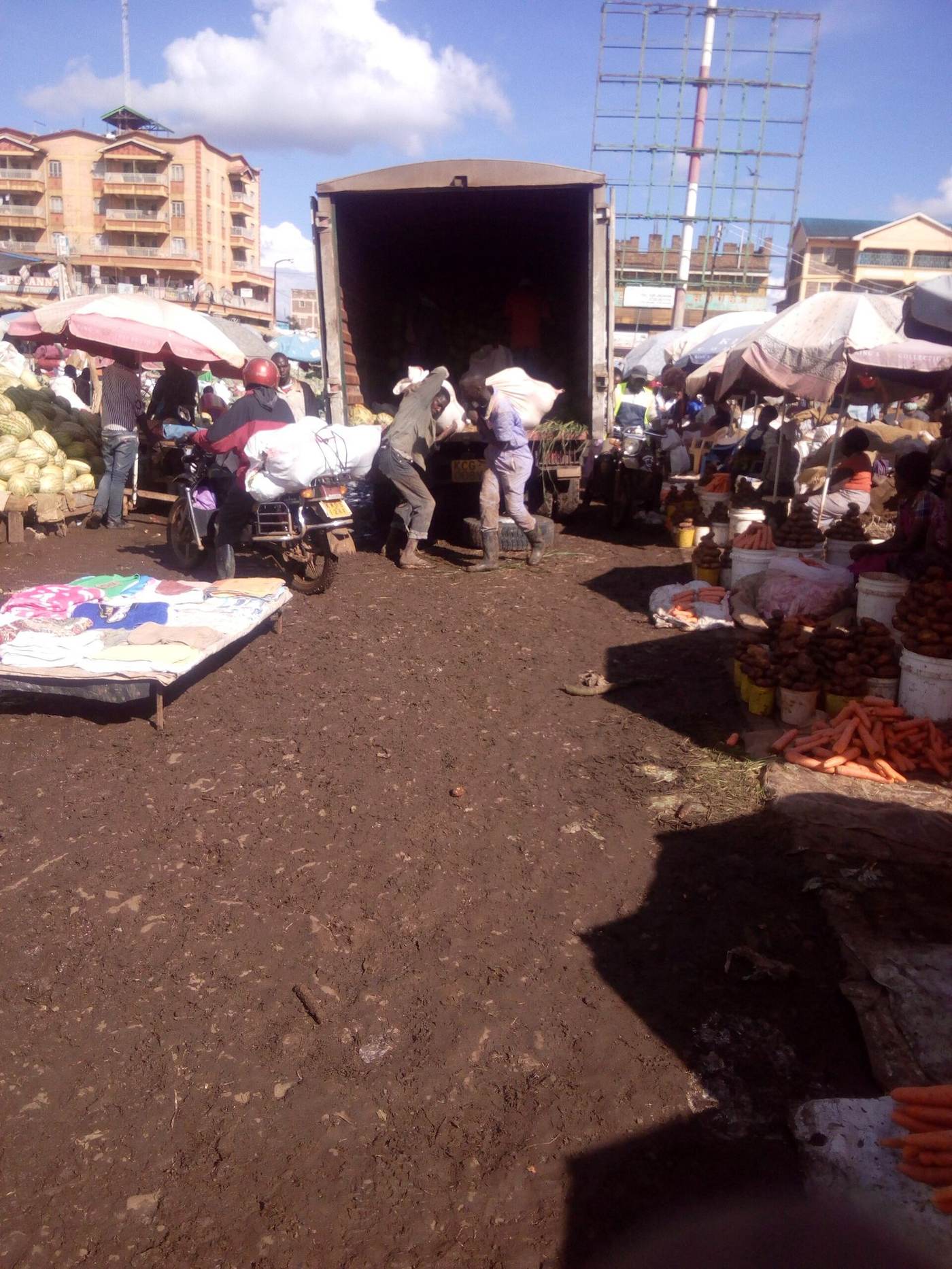 A busy market street in Kenya that depends on reliable power